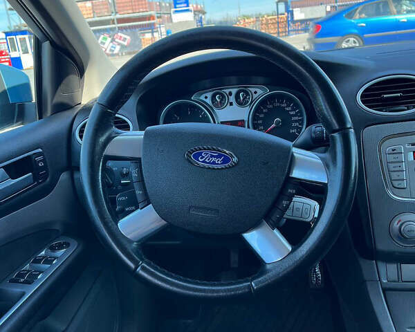 Синій Форд Фокус, об'ємом двигуна 1.56 л та пробігом 274 тис. км за 5950 $, фото 11 на Automoto.ua