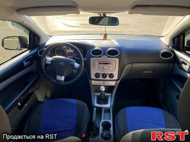 Форд Фокус 2009 у Полтаві на Automoto.ua Синій Форд Фокус, об'ємом двигуна 1.6 л та пробігом 261 тис. км за 6000 $, фото 8 на Automoto.ua