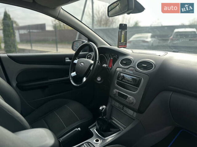 Синий Форд Фокус, объемом двигателя 1.8 л и пробегом 228 тыс. км за 6000 $, фото 48 на Automoto.ua