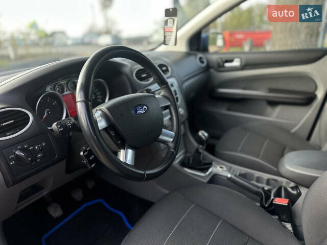 Синий Форд Фокус, объемом двигателя 1.8 л и пробегом 228 тыс. км за 6000 $, фото 25 на Automoto.ua