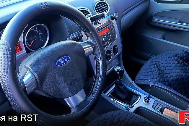 Синий Форд Фокус, объемом двигателя 1.6 л и пробегом 223 тыс. км за 6700 $, фото 8 на Automoto.ua