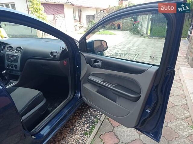 Синий Форд Фокус, объемом двигателя 1.4 л и пробегом 247 тыс. км за 5800 $, фото 21 на Automoto.ua