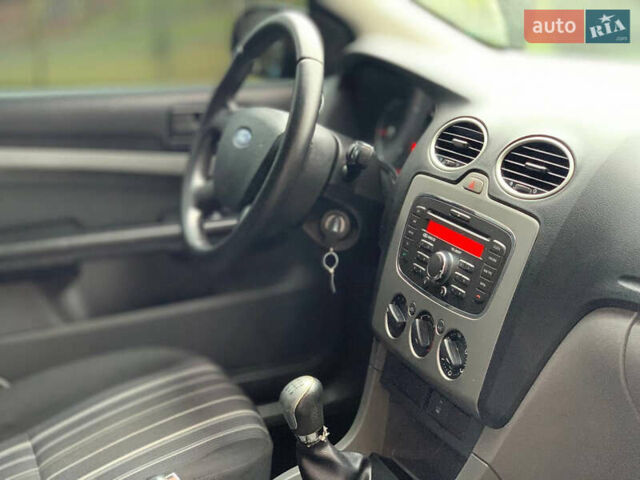 Синий Форд Фокус, объемом двигателя 1.4 л и пробегом 195 тыс. км за 4600 $, фото 32 на Automoto.ua