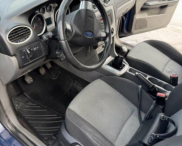 Синій Форд Фокус, об'ємом двигуна 1.4 л та пробігом 240 тис. км за 5900 $, фото 12 на Automoto.ua