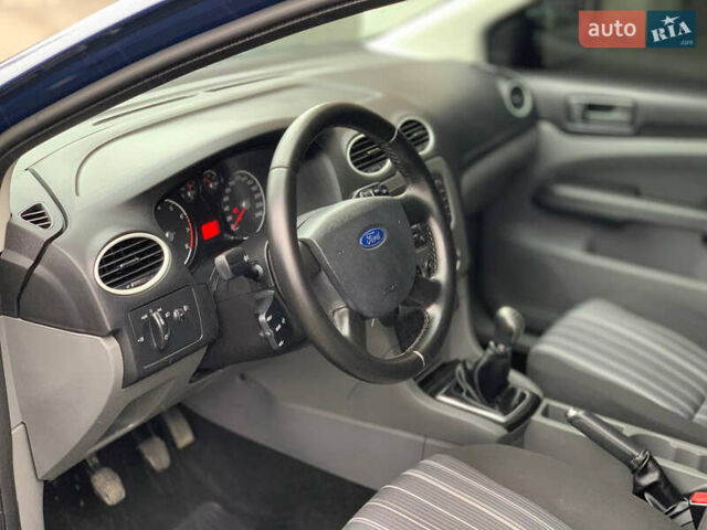 Синий Форд Фокус, объемом двигателя 1.4 л и пробегом 195 тыс. км за 4600 $, фото 28 на Automoto.ua