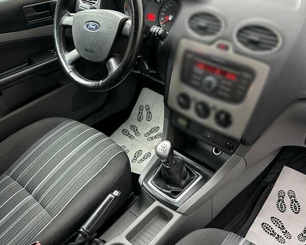 Синий Форд Фокус, объемом двигателя 1.6 л и пробегом 293 тыс. км за 4950 $, фото 7 на Automoto.ua