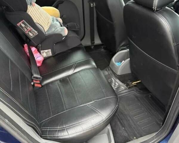 Синий Форд Фокус, объемом двигателя 1.39 л и пробегом 187 тыс. км за 5000 $, фото 3 на Automoto.ua