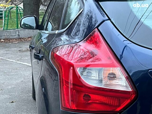 Синій Форд Фокус, об'ємом двигуна 1.6 л та пробігом 258 тис. км за 7990 $, фото 8 на Automoto.ua