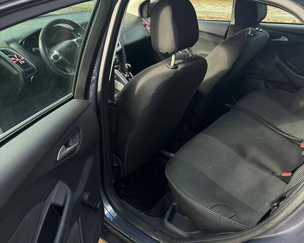 Синий Форд Фокус, объемом двигателя 1.6 л и пробегом 240 тыс. км за 7000 $, фото 13 на Automoto.ua