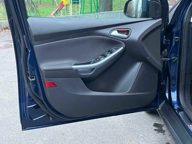 Синій Форд Фокус, об'ємом двигуна 1.6 л та пробігом 258 тис. км за 6740 $, фото 14 на Automoto.ua