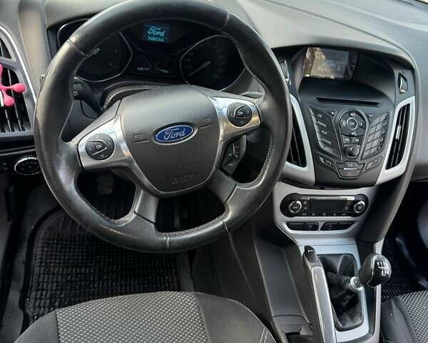 Синий Форд Фокус, объемом двигателя 1.6 л и пробегом 240 тыс. км за 7000 $, фото 10 на Automoto.ua