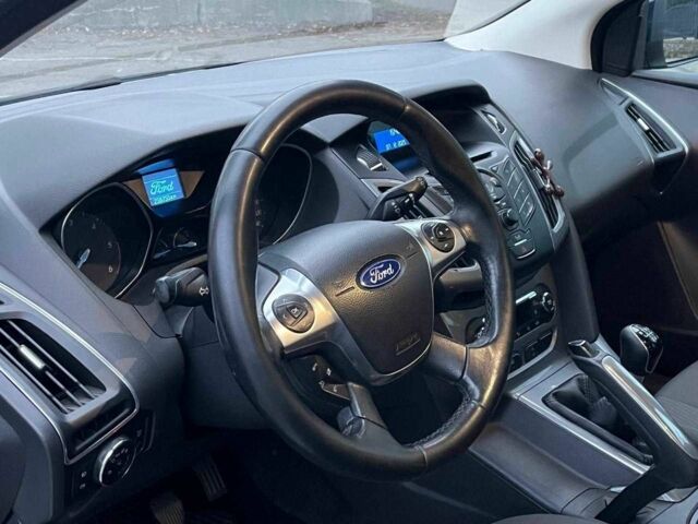 Синій Форд Фокус, об'ємом двигуна 1.6 л та пробігом 258 тис. км за 6740 $, фото 13 на Automoto.ua