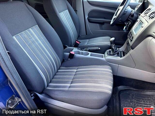 Синий Форд Фокус, объемом двигателя 1.4 л и пробегом 135 тыс. км за 5150 $, фото 11 на Automoto.ua