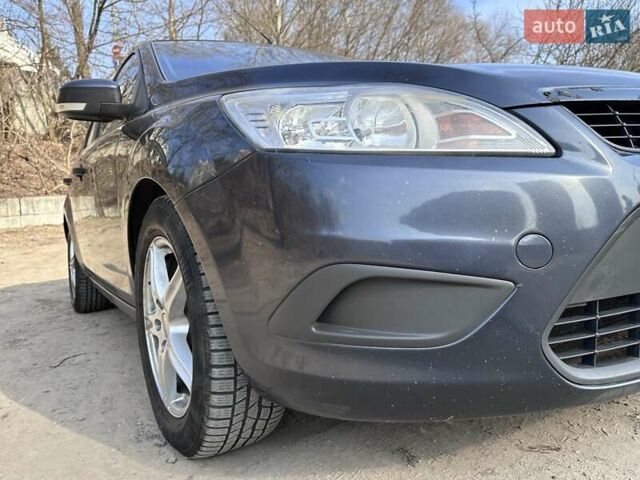 Синий Форд Фокус, объемом двигателя 1.4 л и пробегом 220 тыс. км за 5500 $, фото 6 на Automoto.ua