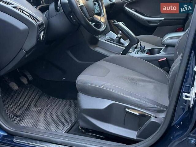 Синій Форд Фокус, об'ємом двигуна 1.6 л та пробігом 258 тис. км за 7990 $, фото 16 на Automoto.ua