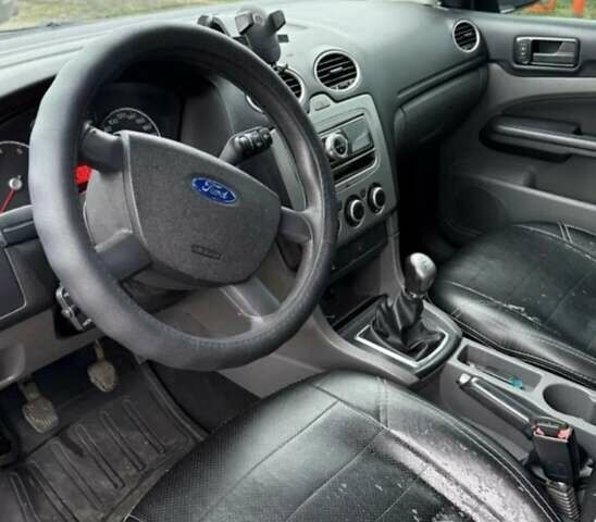 Синий Форд Фокус, объемом двигателя 1.39 л и пробегом 187 тыс. км за 5000 $, фото 4 на Automoto.ua