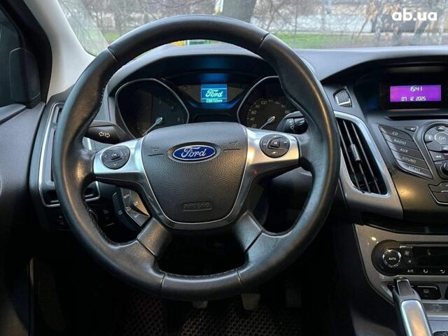 Синій Форд Фокус, об'ємом двигуна 1.6 л та пробігом 258 тис. км за 7990 $, фото 18 на Automoto.ua