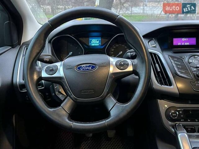 Синій Форд Фокус, об'ємом двигуна 1.6 л та пробігом 258 тис. км за 7990 $, фото 17 на Automoto.ua