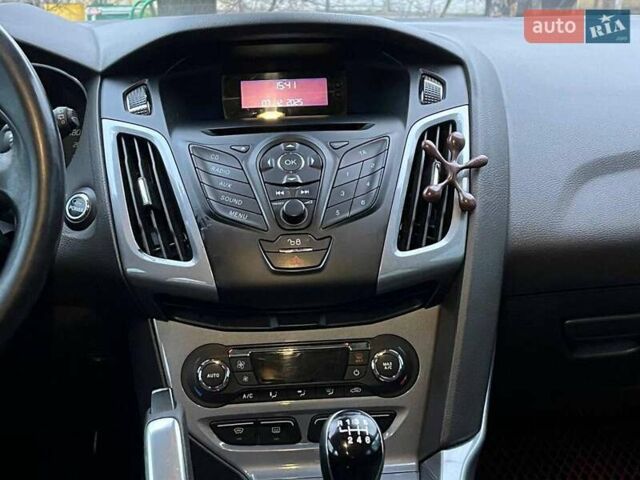 Синій Форд Фокус, об'ємом двигуна 1.6 л та пробігом 258 тис. км за 7990 $, фото 19 на Automoto.ua