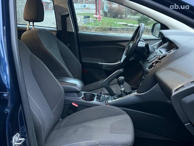 Синій Форд Фокус, об'ємом двигуна 1.6 л та пробігом 258 тис. км за 7990 $, фото 11 на Automoto.ua