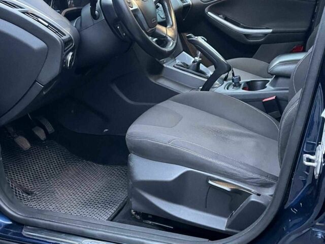 Синій Форд Фокус, об'ємом двигуна 1.6 л та пробігом 258 тис. км за 6740 $, фото 16 на Automoto.ua