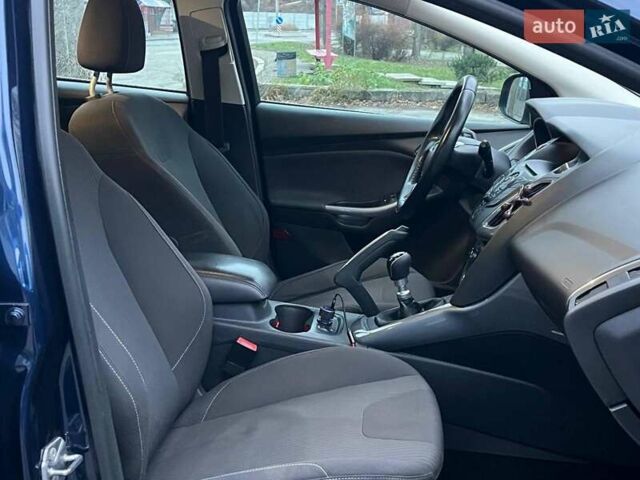 Синій Форд Фокус, об'ємом двигуна 1.6 л та пробігом 258 тис. км за 7990 $, фото 11 на Automoto.ua