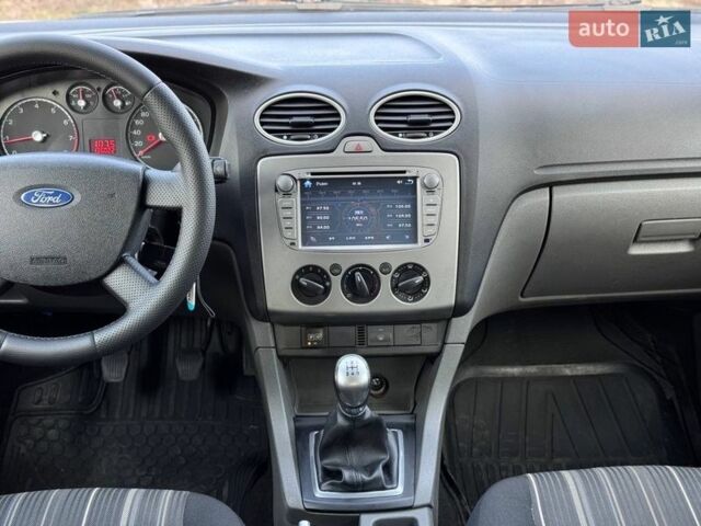 Синий Форд Фокус, объемом двигателя 1.39 л и пробегом 136 тыс. км за 5350 $, фото 21 на Automoto.ua