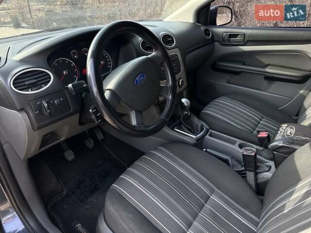 Синий Форд Фокус, объемом двигателя 1.4 л и пробегом 220 тыс. км за 5500 $, фото 7 на Automoto.ua