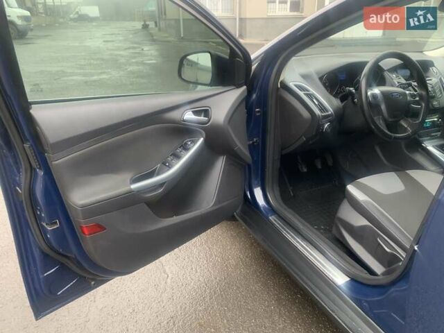 Синій Форд Фокус, об'ємом двигуна 1.6 л та пробігом 173 тис. км за 7000 $, фото 14 на Automoto.ua