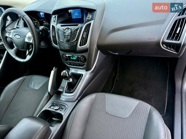 Синій Форд Фокус, об'ємом двигуна 1.6 л та пробігом 241 тис. км за 6999 $, фото 23 на Automoto.ua