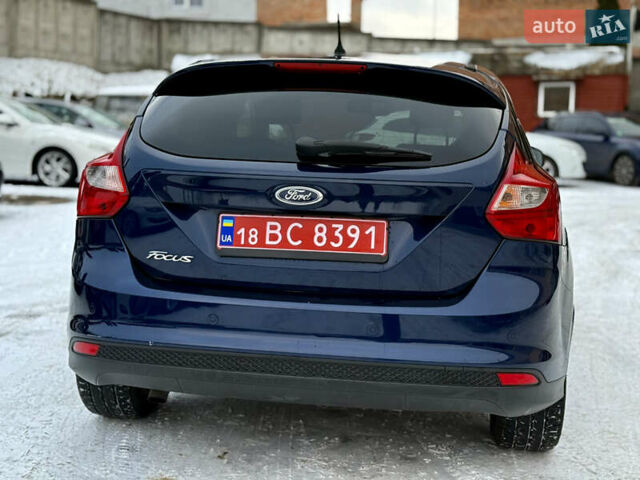 Синій Форд Фокус, об'ємом двигуна 1.6 л та пробігом 241 тис. км за 6999 $, фото 7 на Automoto.ua