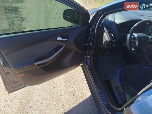 Синий Форд Фокус, объемом двигателя 1 л и пробегом 180 тыс. км за 5200 $, фото 14 на Automoto.ua