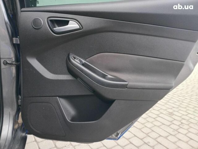 Синій Форд Фокус, об'ємом двигуна 2 л та пробігом 303 тис. км за 6940 $, фото 16 на Automoto.ua