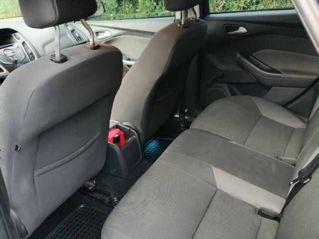 Синий Форд Фокус, объемом двигателя 1 л и пробегом 116 тыс. км за 6600 $, фото 7 на Automoto.ua