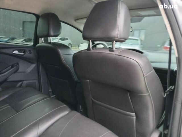 Синій Форд Фокус, об'ємом двигуна 2 л та пробігом 303 тис. км за 6940 $, фото 15 на Automoto.ua