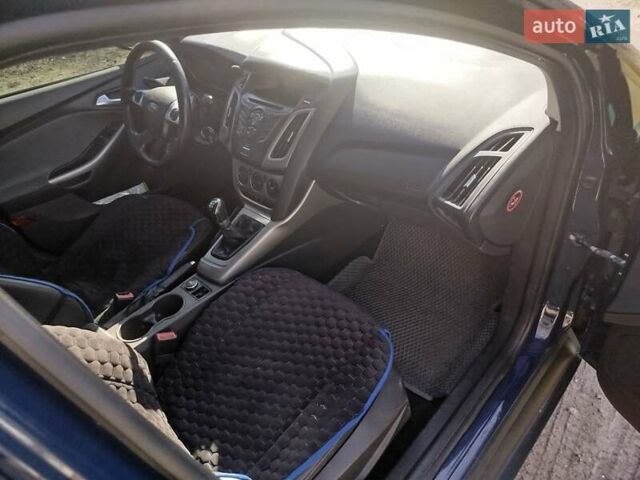 Синий Форд Фокус, объемом двигателя 1 л и пробегом 180 тыс. км за 5200 $, фото 10 на Automoto.ua