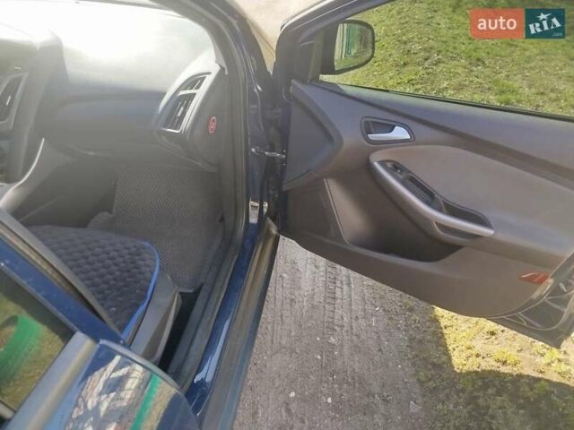 Синий Форд Фокус, объемом двигателя 1 л и пробегом 180 тыс. км за 5200 $, фото 9 на Automoto.ua