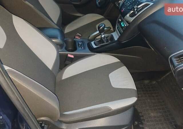 Синій Форд Фокус, об'ємом двигуна 1 л та пробігом 164 тис. км за 6000 $, фото 16 на Automoto.ua