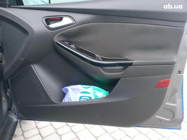 Синій Форд Фокус, об'ємом двигуна 2 л та пробігом 303 тис. км за 6940 $, фото 12 на Automoto.ua