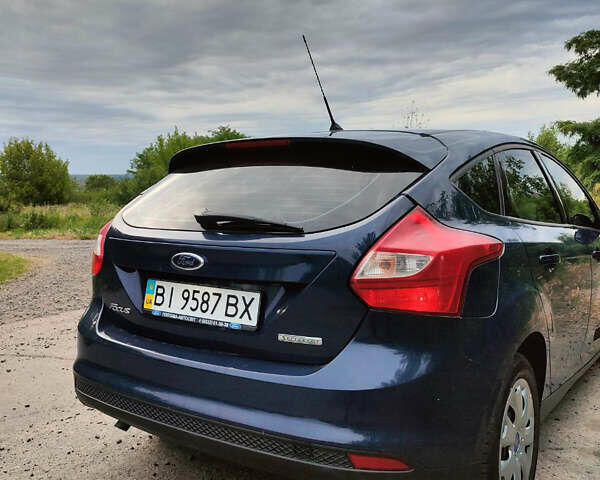 Синій Форд Фокус, об'ємом двигуна 1 л та пробігом 116 тис. км за 7300 $, фото 2 на Automoto.ua
