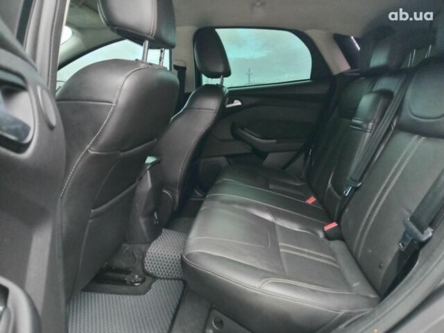 Синій Форд Фокус, об'ємом двигуна 2 л та пробігом 303 тис. км за 6940 $, фото 17 на Automoto.ua