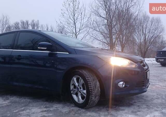 Синій Форд Фокус, об'ємом двигуна 1 л та пробігом 164 тис. км за 6000 $, фото 29 на Automoto.ua