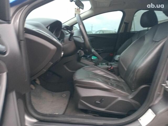 Синій Форд Фокус, об'ємом двигуна 2 л та пробігом 303 тис. км за 6940 $, фото 20 на Automoto.ua