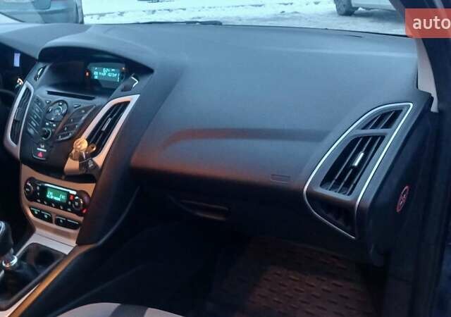 Синій Форд Фокус, об'ємом двигуна 1 л та пробігом 164 тис. км за 6000 $, фото 15 на Automoto.ua