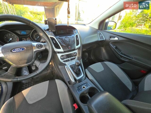 Синій Форд Фокус, об'ємом двигуна 1.6 л та пробігом 176 тис. км за 7600 $, фото 6 на Automoto.ua