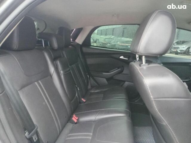 Синій Форд Фокус, об'ємом двигуна 2 л та пробігом 303 тис. км за 6940 $, фото 14 на Automoto.ua