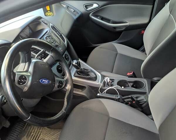 Синий Форд Фокус, объемом двигателя 1 л и пробегом 150 тыс. км за 6940 $, фото 4 на Automoto.ua