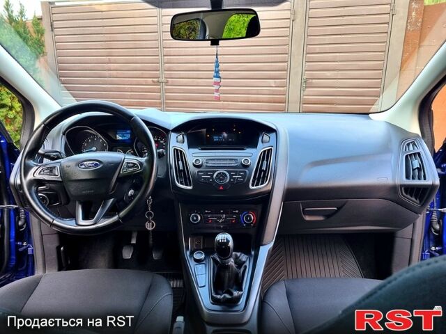 Синий Форд Фокус, объемом двигателя 1 л и пробегом 224 тыс. км за 5950 $, фото 3 на Automoto.ua