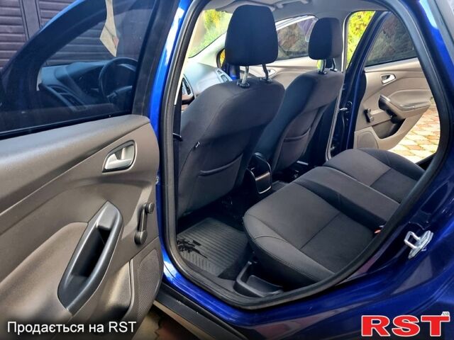 Синий Форд Фокус, объемом двигателя 1 л и пробегом 224 тыс. км за 5950 $, фото 6 на Automoto.ua