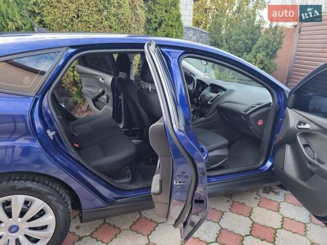 Синій Форд Фокус, об'ємом двигуна 1 л та пробігом 224 тис. км за 6700 $, фото 13 на Automoto.ua
